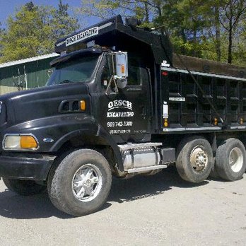 Oesch Excavating - Small loads delivered with our tri axle dump truck - Excavation Services Near Me - Atlanta, Michigan