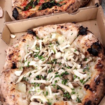 Lodge Bread - Cremni mushroom white pizza & spicy red Margherita pizza - Bakeries Near Me - Los Angeles, California