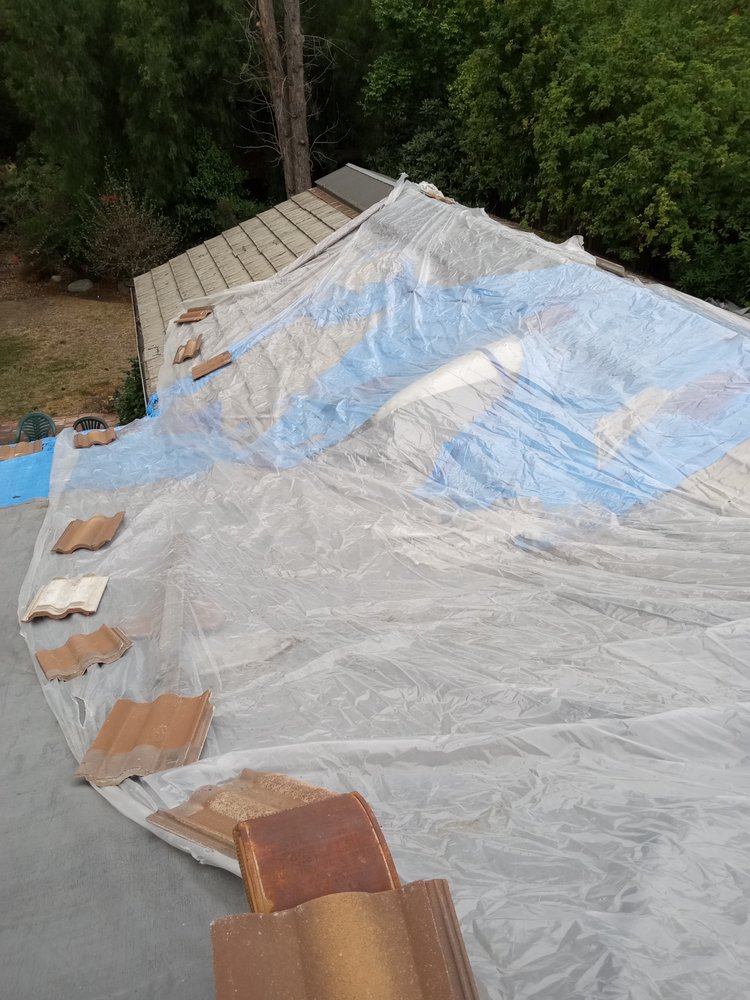 Slide of Hernandez Roofing