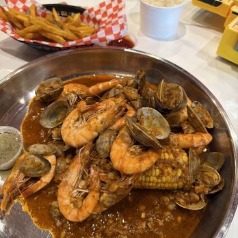 Grab A Crab - Shrimp,clams, corn in grab a crab house sauce - Seafood Near Me - Baldwin Park, California Grab A Crab - Shrimp,clams, corn in grab a crab house sauce - Seafood Near Me - Baldwin Park, California