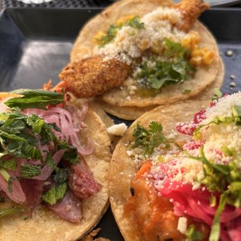Little Bad Wolf - Duck, fish, shrimp tacos starting from the 7:00 position and going clockwise. - American Near Me - Chicago, Illinois
