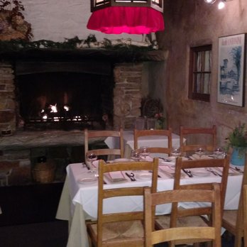 Fandango Restaurant - Cosy fireplace in one of the dining areas - French Near Me - Pacific Grove, California