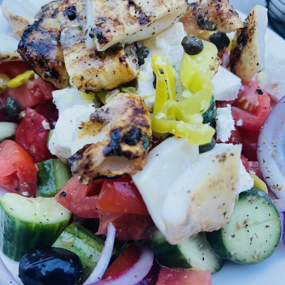 Greek Taverna - Greek salad with grilled calamari - Greek Near Me - Edgewater, New Jersey Greek Taverna - Greek salad with grilled calamari - Greek Near Me - Edgewater, New Jersey