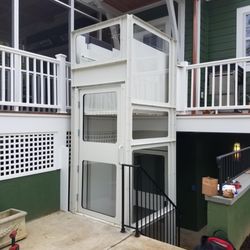 Solano Mobility & Accessibility - Wheelchair lift with enclosure at intermediate landing