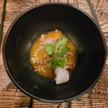 RGE RD - a bowl of soup on a wooden table - Canadian (New) Near Me - Edmonton, Alberta