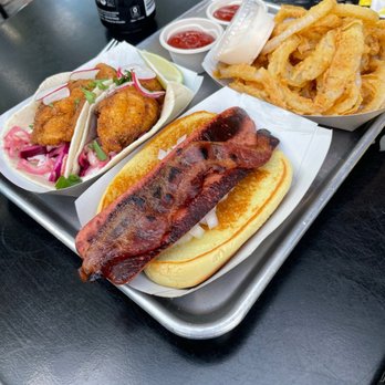 the knack - Hot dog with bacon, onion rings, two fish tacos, two drinks.  $43.00 plus tip.  Reasonable? No. - Seafood Near Me - Orleans, Massachusetts