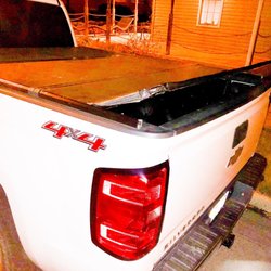Parsons' Hook - The bed cover after allowing Parson's to tow us. We asked for a tire change and this is what we got.
