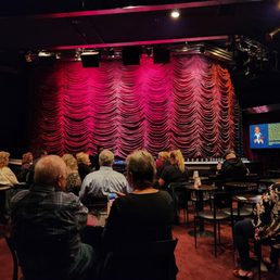 Sitting in the back row on a booth like seat in the back row. Great seats! Sitting in the back row on a booth like seat in the back row. Great seats!