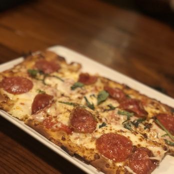 Del Frisco's Grille - Roasted Tomato & Pepperoni Flatbread - New American Near Me - Hoboken, New Jersey Del Frisco's Grille - Roasted Tomato & Pepperoni Flatbread - New American Near Me - Hoboken, New Jersey
