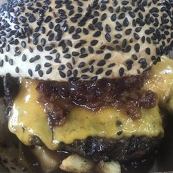 Burger Hounds - Succulent pattie with fries, gravy and the most delicious relish consisting of onions, bacon and maple syrup.