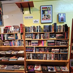 Joy of Books - Bill Lewis of Vero Beach, Florida, checking out the Joy of Books while visiting Hendersonville, North Carolina.