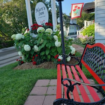 Hart's - Take a rest on the red bench near the street and watch the horses, bikes and people go by. - Bed & Breakfast Near Me