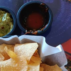 Chips & guacamole $5, salsa is upcharge and no refills.