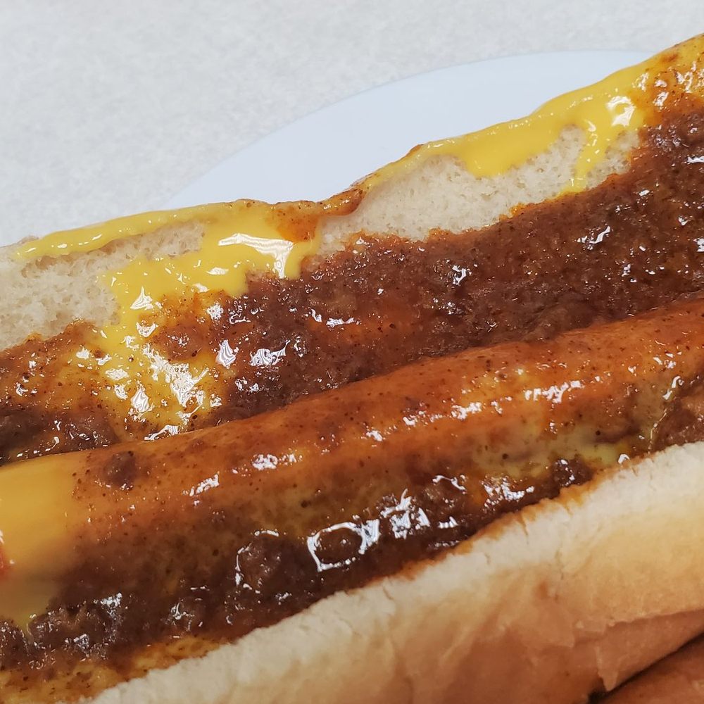 Hot dog with cheese and chili Hot dog with cheese and chili