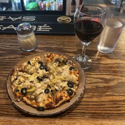 Glass of Josh Cabernet Sauvignon wine and a mini pizza - The Bunseye