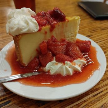 Golden Harvest Cafe - a slice of cheesecake with strawberries and whipped cream - American Near Me - Pahrump, Nevada