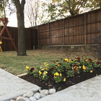 Ben N Dads - a flower bed in the backyard - Lawn Services Near Me - Coppell, Texas Ben N Dads - a flower bed in the backyard - Lawn Services Near Me - Coppell, Texas