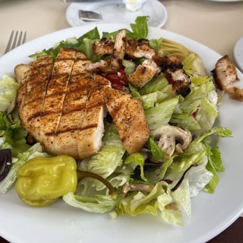 Bella Sera - Bella Sera salad with chicken added  So much on the plate that l took half home for lunch tomorrow. - Italian Near Me - Llano, Texas
