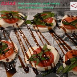 The FourNine - Caprese Salad - Fresh mozzarella, sliced tomato, basil and balsamic drizzle.
I.G = kim.d.west