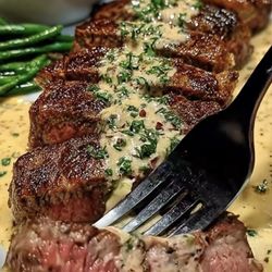 Parlor House Grill - Steak, medium rare with an amazing sauce with some nice fresh bread no, I did not lick the plate