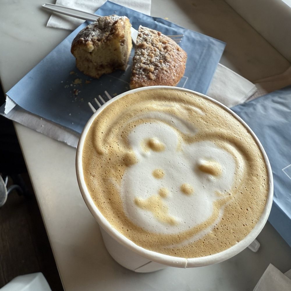 Simple syrup latte and cinnamon coffee cake.
