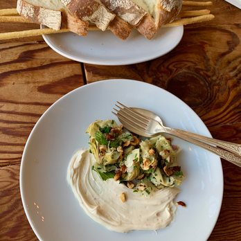 Cascina Spinasse - Baby artichokes with hazelnuts, mint and honey-controne mascarpone.  And bread and breadsticks.  So yum. - Italian Near Me - Seattle, Washington
