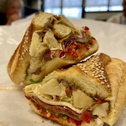 mercato cucina - Stugots- April 24 monthly special - Gabagool , sharp provolone , vinegar peppers , artichokes relish, bomba chili on semolina