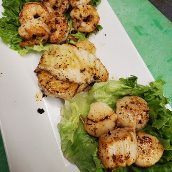 Rock Island Grill - Island Sampler; Grilled shrimp, scallops and pan fried Sea Bass - American Near Me - Branson, Missouri