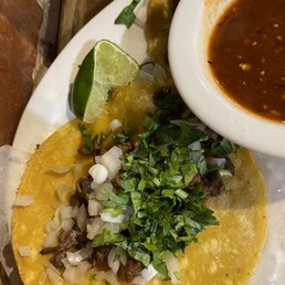 One of my 4 carne asada tacos One of my 4 carne asada tacos