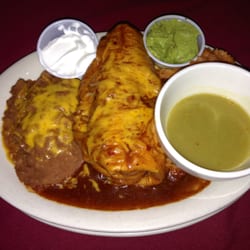 Manda Le Bar & Grill - Chimichanga Plate Enchilada Style with Beans and a Side of Green Chili Sauce