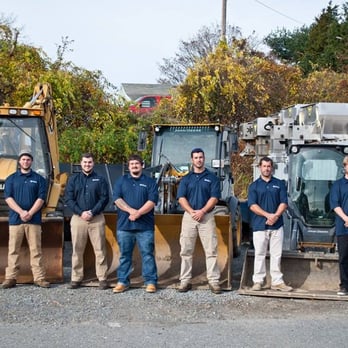 Premier Gunite Pools - a group of men standing in front of a bulldozer - Landscaping Near Me - Portsmouth, Rhode Island Premier Gunite Pools - a group of men standing in front of a bulldozer - Landscaping Near Me - Portsmouth, Rhode Island