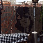Photo of Three Aces - Chicago, IL, United States. Patio seating fence