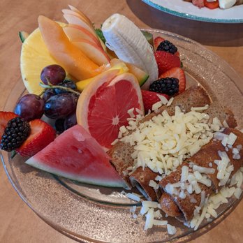 Cora - Buckwheat sausage crepe + fruit - Breakfast & Brunch Near Me - Edmonton, Alberta