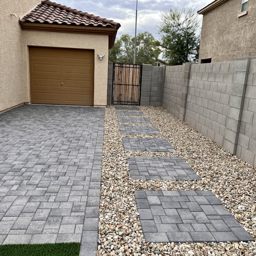 Desert Pointe landscape - a driveway with pavers and a gate - Landscaping Near Me Desert Pointe landscape - a driveway with pavers and a gate - Landscaping Near Me