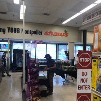 Shaw's - a man standing at a cash register in a store - Grocery Near Me - Montpelier, Vermont Shaw's - a man standing at a cash register in a store - Grocery Near Me - Montpelier, Vermont