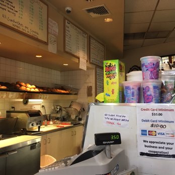 What A Bagel Cafe - a counter with a lot of items on it - Bagels Near Me - White Plains, New York