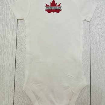 Academix Schoolhouse - A onesie provided by Mrs. Joyce - Child Care & Day Care Near Me