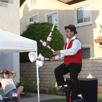 Minh Tran - Magician - Minh performing - Magicians Near Me Minh Tran - Magician - Minh performing - Magicians Near Me