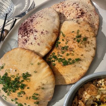 ARLA - Garlic pita and charred scallion pita - Mediterranean Near Me - Chicago, Illinois ARLA - Garlic pita and charred scallion pita - Mediterranean Near Me - Chicago, Illinois