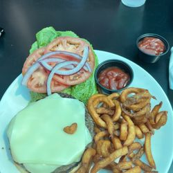 Cheeseburger and curly fries