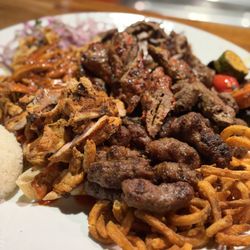 Halal mixed grilled kebab feast platter, doner, chiken, tenderloin, grilled meats,  beyti, chicken kebab