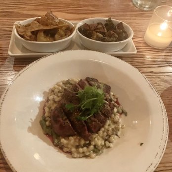 Whiskey Cake Kitchen & Bar - Beef on cous cous .. with sides of mushroom parpadelle and brussel sprouts - New American Near Me - Katy, Texas Whiskey Cake Kitchen & Bar - Beef on cous cous .. with sides of mushroom parpadelle and brussel sprouts - New American Near Me - Katy, Texas