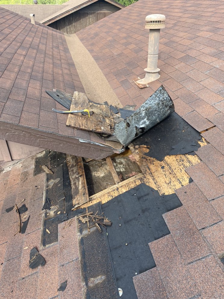 Slide of JV Roofing Repair