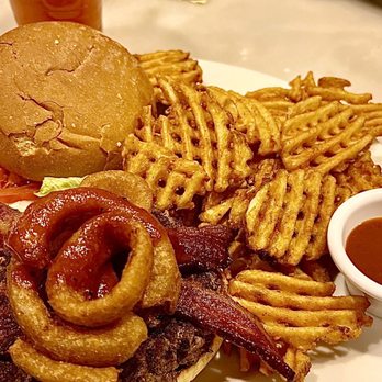 Café Milano - Giant bacon burger topped with onion rings, bbq sauce and all the fixings with excellent waffle fries. - American Near Me - Reno, Nevada Café Milano - Giant bacon burger topped with onion rings, bbq sauce and all the fixings with excellent waffle fries. - American Near Me - Reno, Nevada