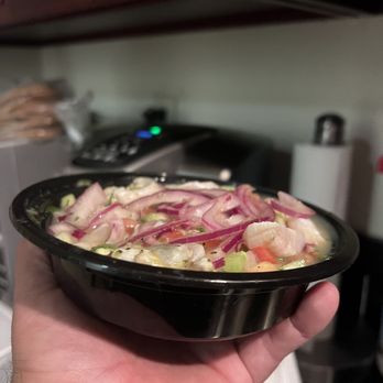Mariscos El Plebe - My hands aren't the biggest and even then the container looks so small I'm not kidding when I tell you they ripped us off. - Mexican Near Me - Paramount, California Mariscos El Plebe - My hands aren't the biggest and even then the container looks so small I'm not kidding when I tell you they ripped us off. - Mexican Near Me - Paramount, California