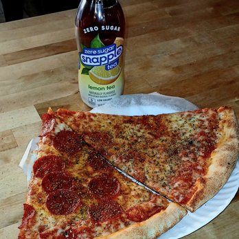Piz-zetta Pizzeria - Pepperoni and regular cheese slice with lemon ice tea. - Italian Near Me - Brooklyn, New York Piz-zetta Pizzeria - Pepperoni and regular cheese slice with lemon ice tea. - Italian Near Me - Brooklyn, New York