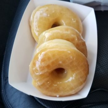 Best Donuts - three glazed donuts on a white plate - Donuts Near Me - Spring, Texas