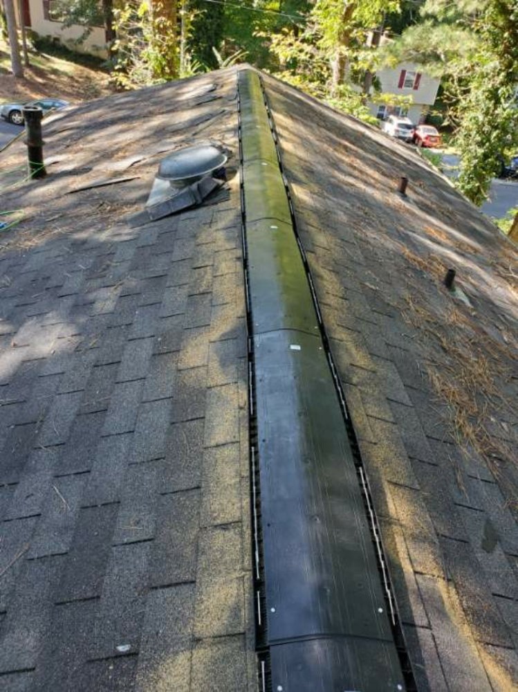 Slide of Rashids Roofing