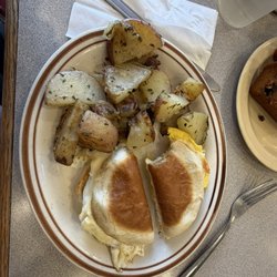Rod's Grille - Egg (1) & Cheese with Homefries on a bolo