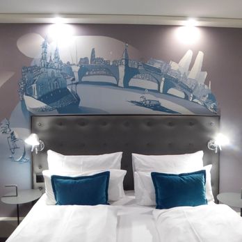 Motel One Basel - The bed and backdrop - Hotels Near Me - Basel, BS